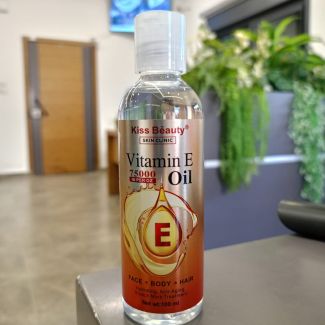 زيت تفتيح الجسم kiss beauty ( فيتامين E )